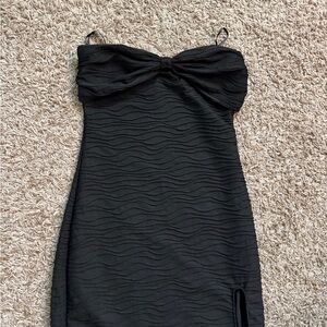 black bodycon dress with leg slit